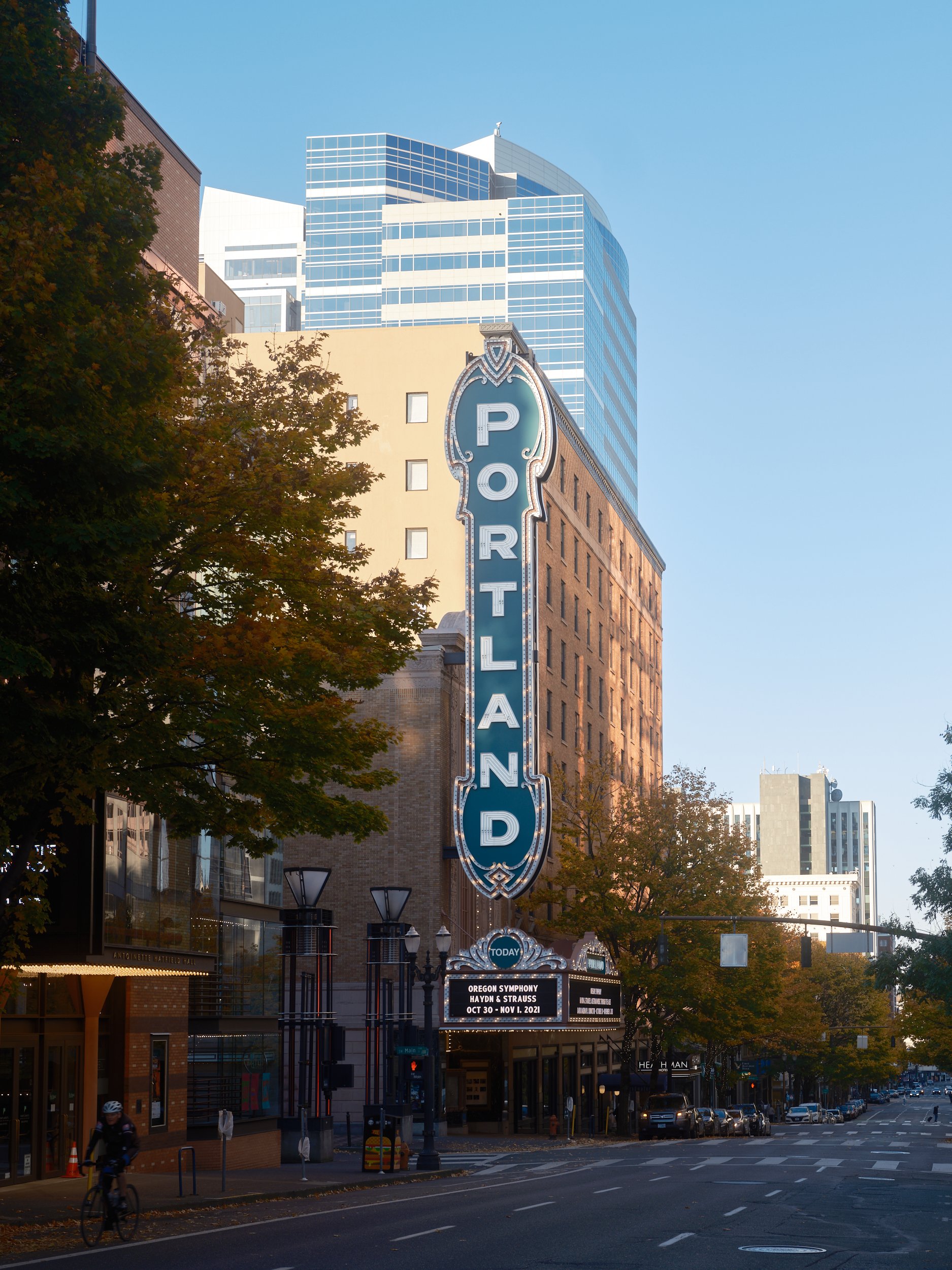 Arlene Schnitzer Concert Hall and its famous Portland sign and marquee seen from Southwest Broadway looking north.
