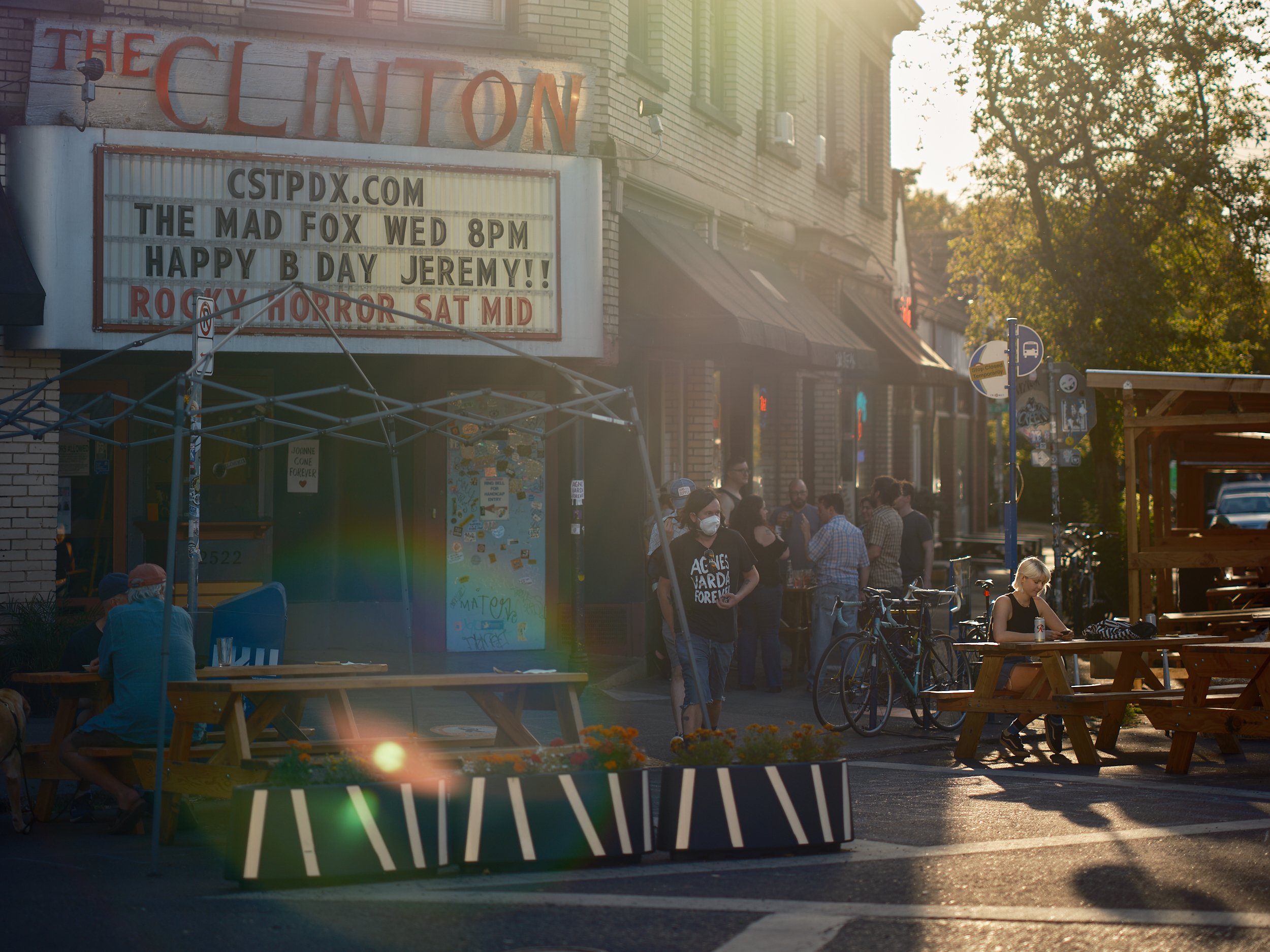 The Clinton Street Theater on an early summer evening with crowds enjoying the nice weather.