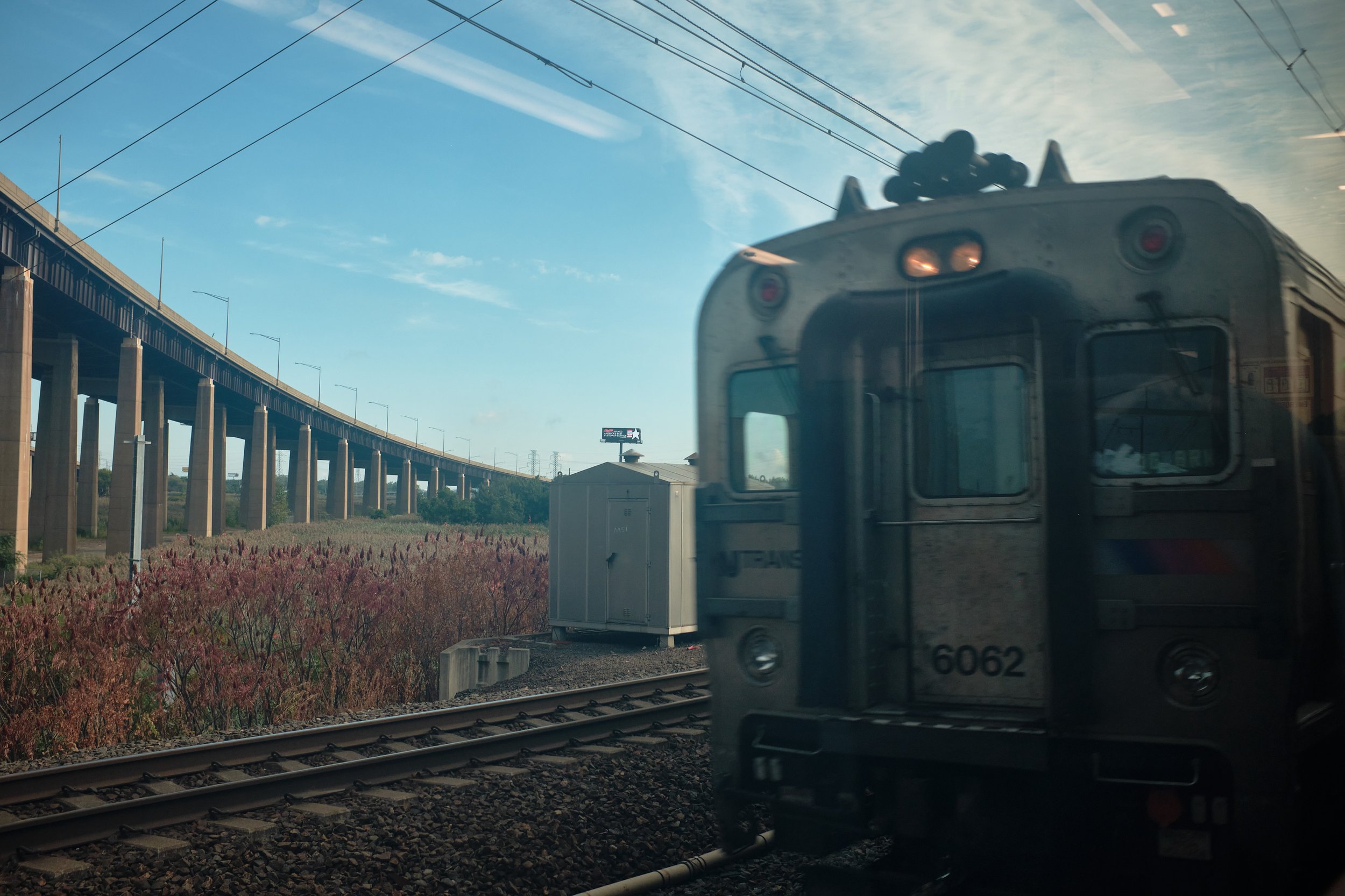 A New Jersey Transit train is passing near Newark.
