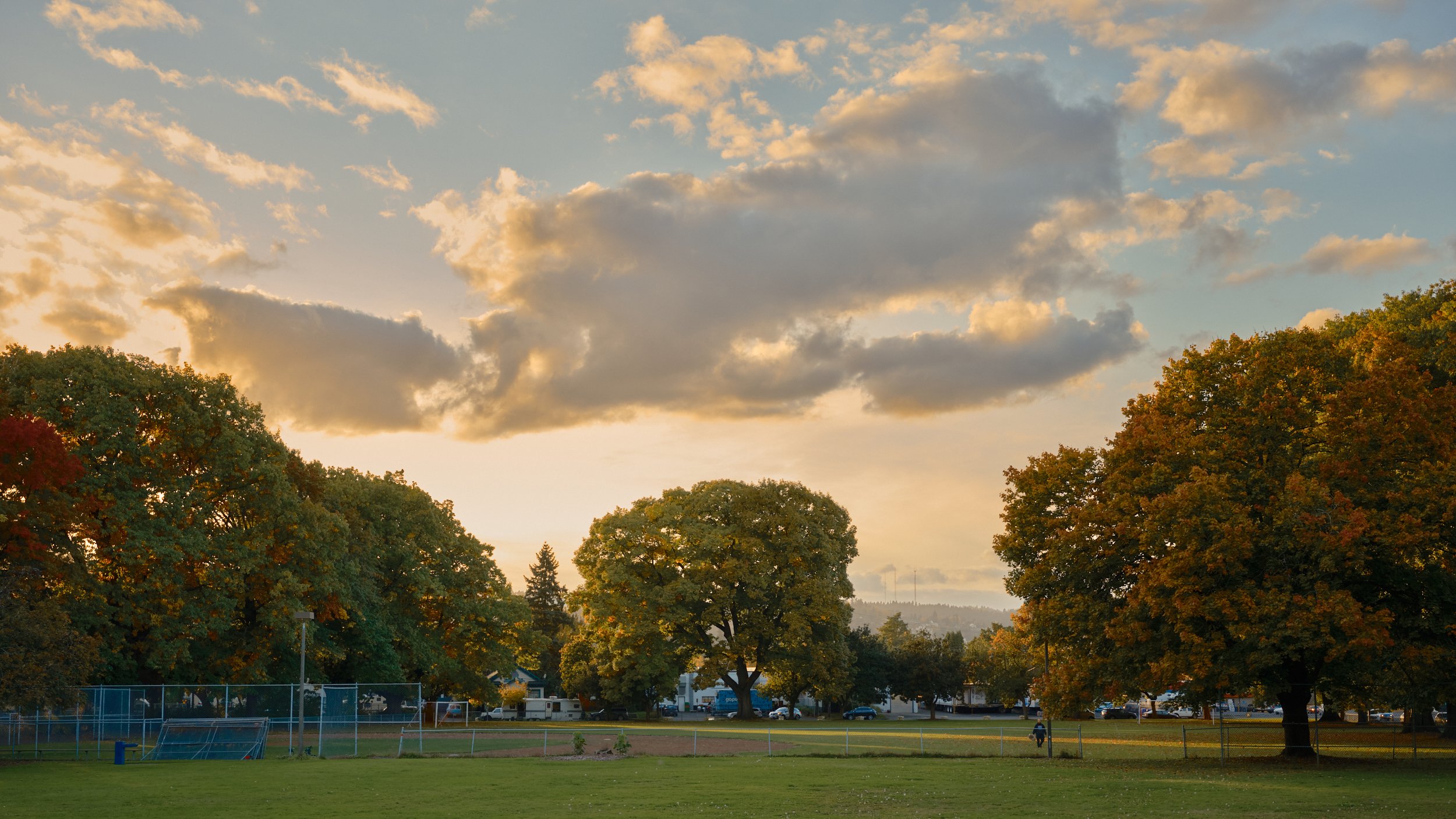 Powell Park in Portland, Oregon with autumn tree foliage visible.