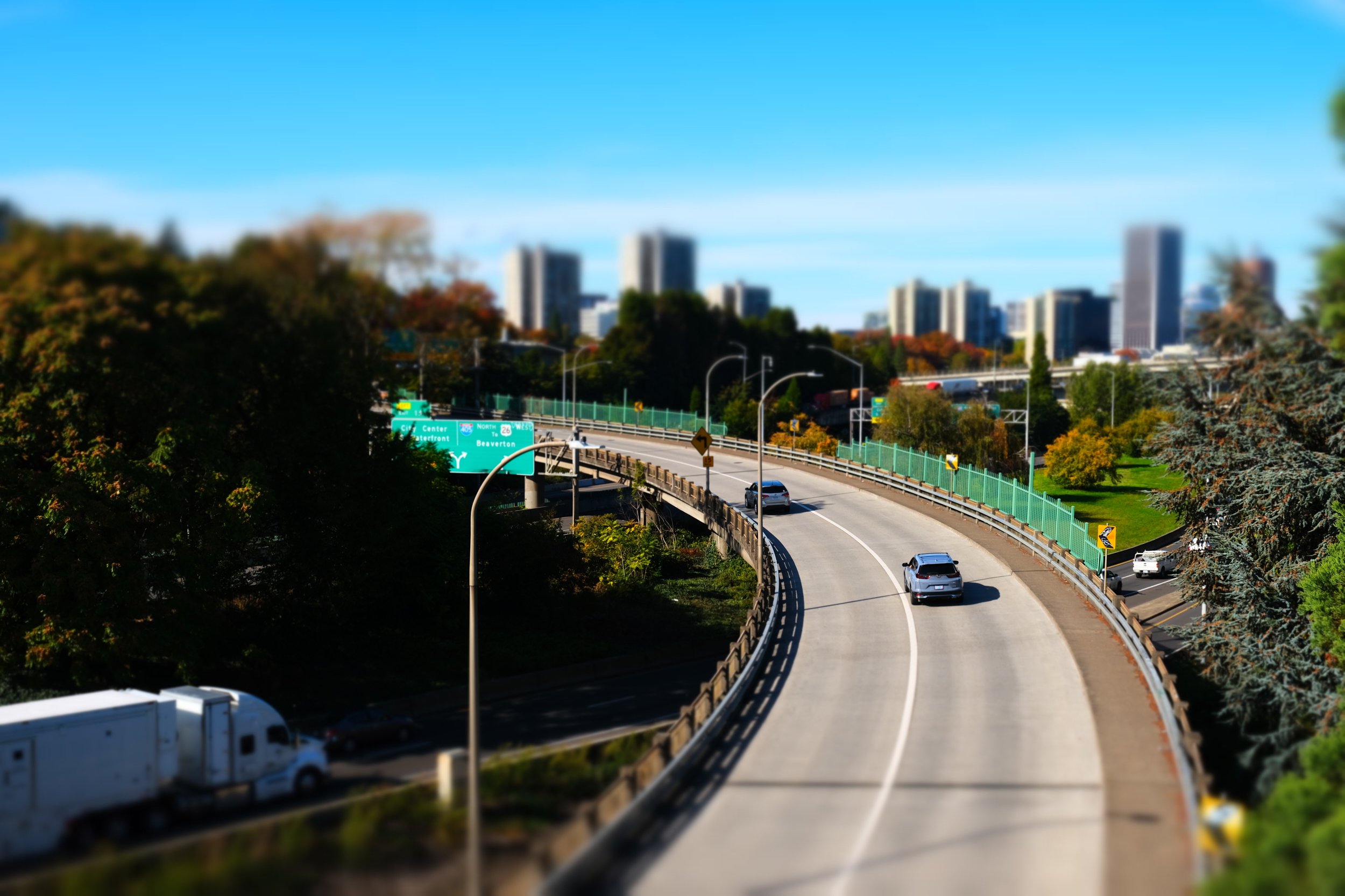 Cars are crossing an overpass over Interstate 5 in South Portland, Oregon.